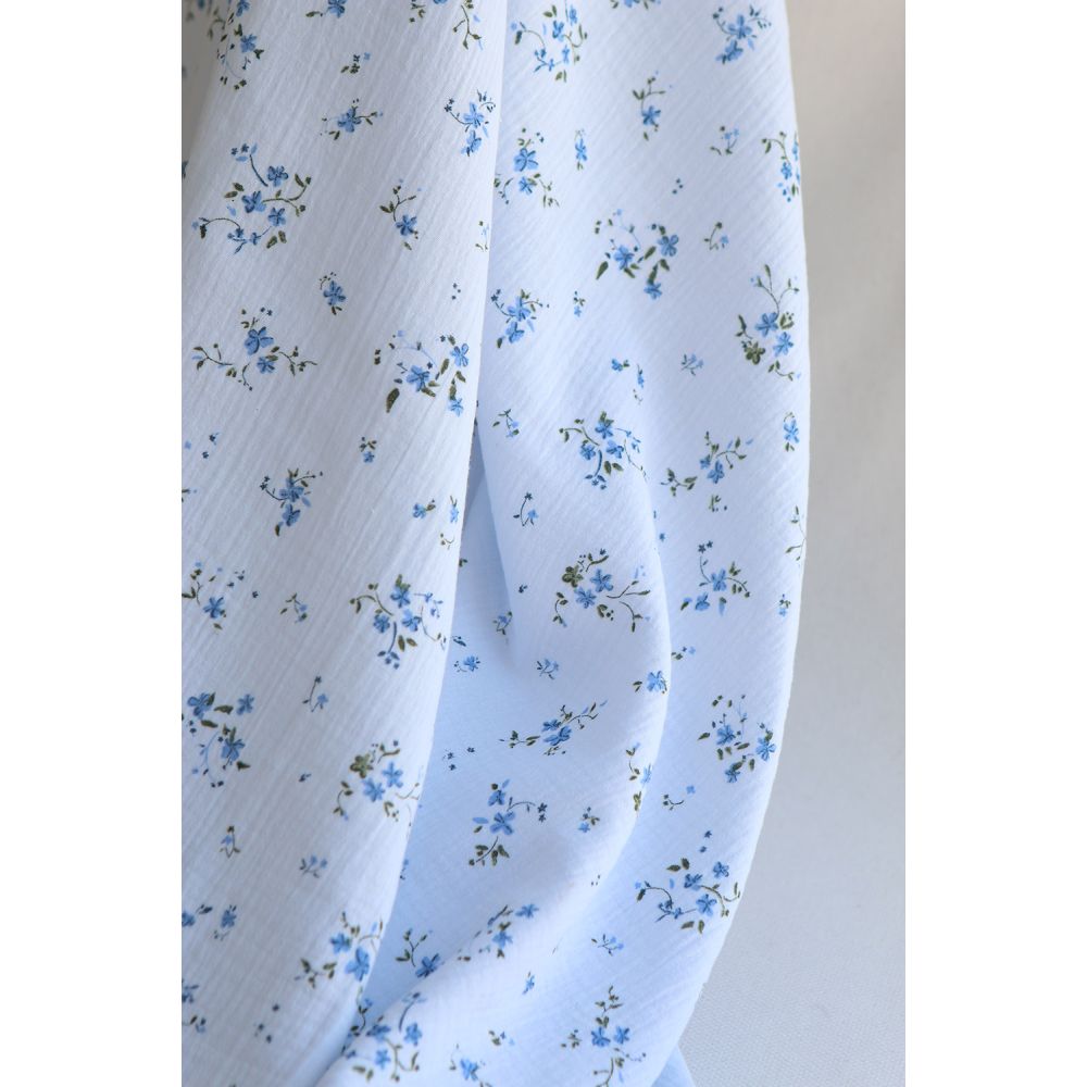 Sofia - Double gaze de coton motif fleuri fond bleu ciel