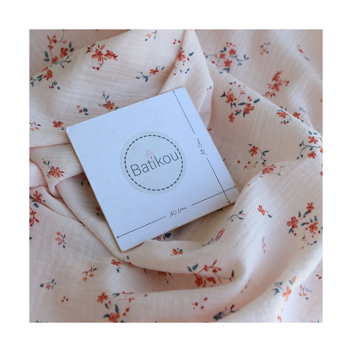 Sofia - Double gaze de coton motif fleuri fond rose Sofia - Double gaze de coton motif fleuri fond rose