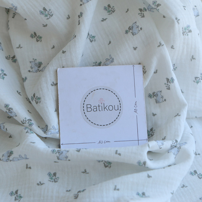 Yuki - Double gaze de coton fond blanc motif petits lapins bleu