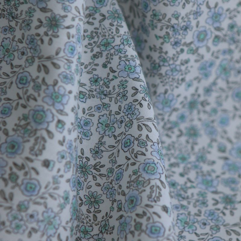 Suzanne - Popeline de coton douce qualité SWEET motif bleu ciel