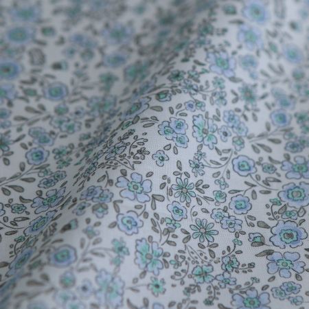 Suzanne - Popeline de coton douce qualité SWEET motif bleu ciel Suzanne - Popeline de coton douce qualité SWEET motif bleu ciel