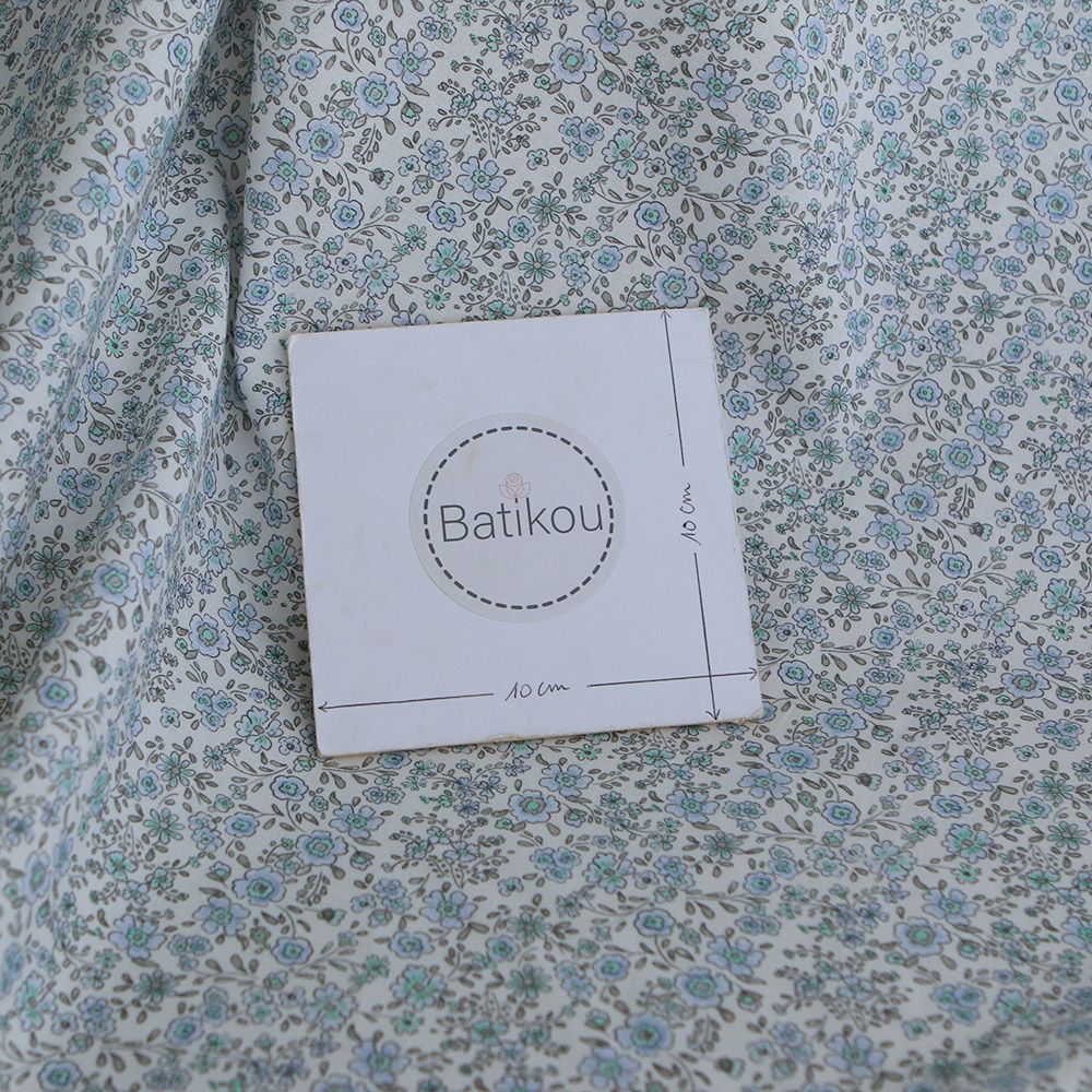 Suzanne - Popeline de coton douce qualité SWEET motif bleu ciel