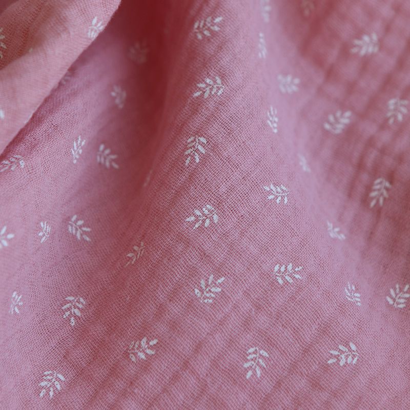 Sacha - Double gaze de coton motif feuilles fond rose blush
