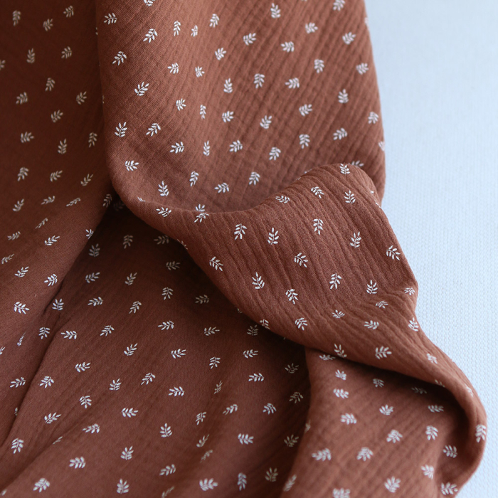 Sacha - Double gaze de coton motif feuilles fond noisette