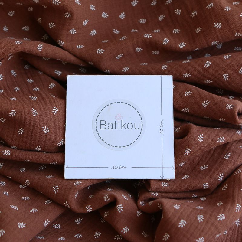 Sacha - Double gaze de coton motif feuilles fond noisette
