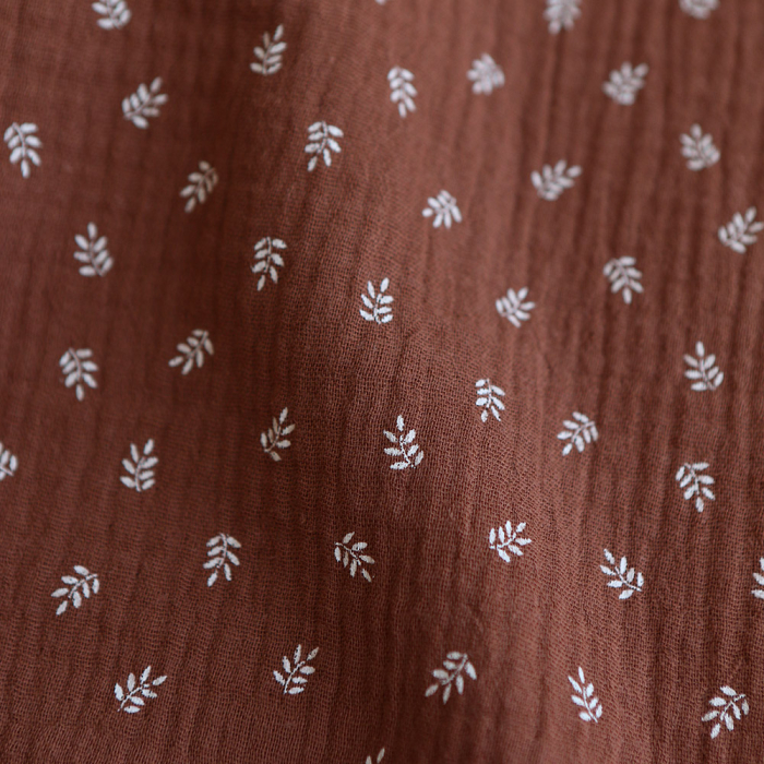 Sacha - Double gaze de coton motif feuilles fond noisette