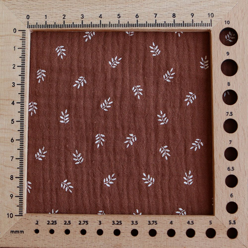 Sacha - Double gaze de coton motif feuilles fond noisette