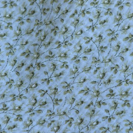 Harper - Double gaze de coton motif fleuri fond bleu ciel Harper - Double gaze de coton motif fleuri fond bleu ciel