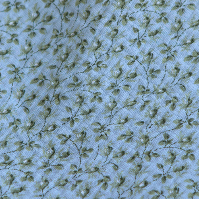 Harper - Double gaze de coton motif fleuri fond bleu ciel
