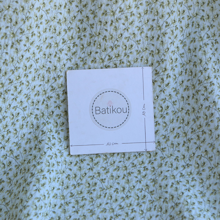 Harper - Double gaze de coton motif fleuri fond bleu ciel