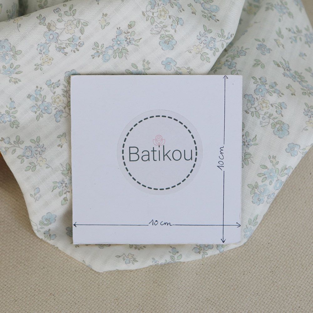 Scarlett - Seersucker / Coton gaufré doux fond lait fleuri bleu