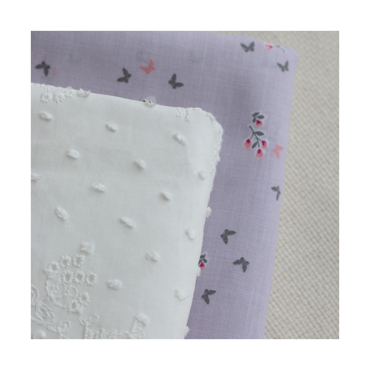 Broderie anglaise voile de coton coloris blanc cassé