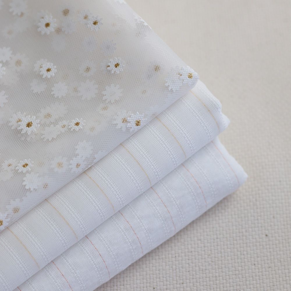 Tissu coton texturé / jacquard lurex métallisé doré