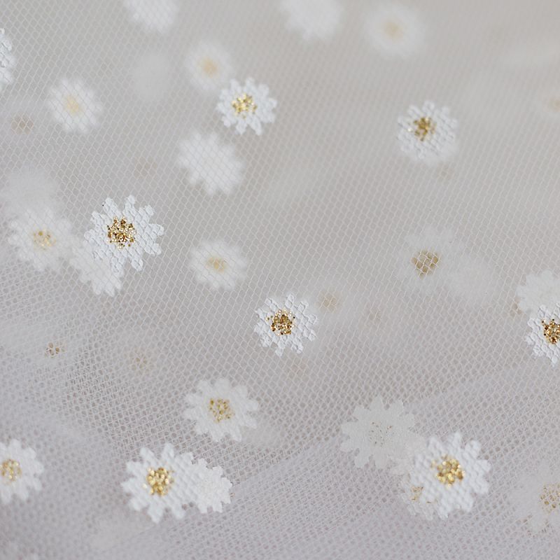 Tulle blanc petites marguerites dorées