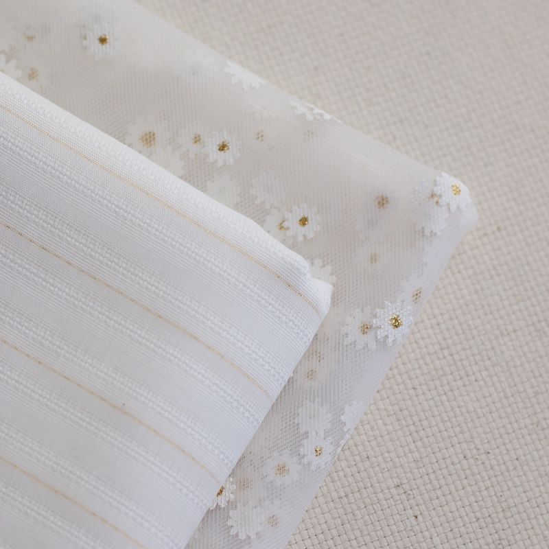 Tulle blanc petites marguerites dorées