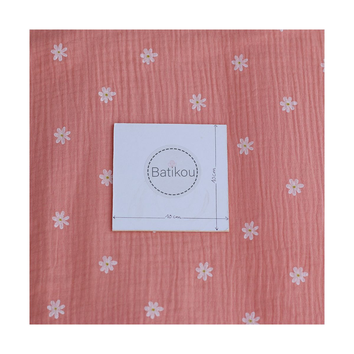 Daisy - Double gaze de coton marguerites fond corail Daisy - Double gaze de coton marguerites fond corail