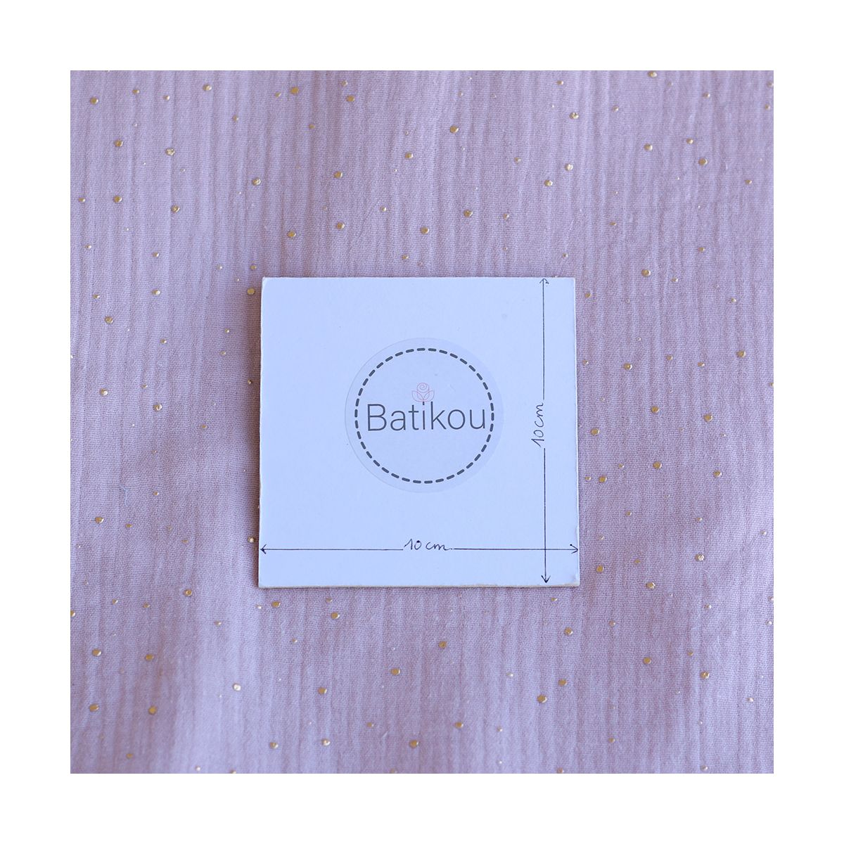 Double gaze de coton pois dorés fond vieux rose