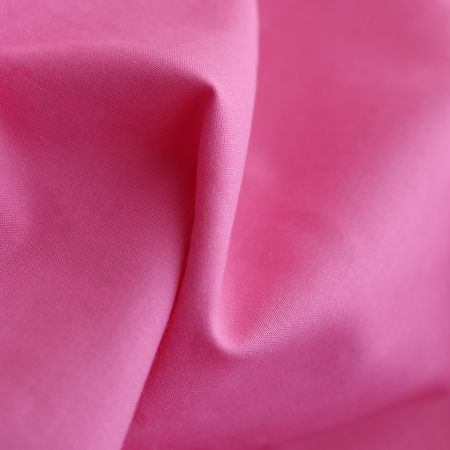 Popeline coton douce qualité SWEET coloris uni framboise Popeline coton douce qualité SWEET coloris uni framboise