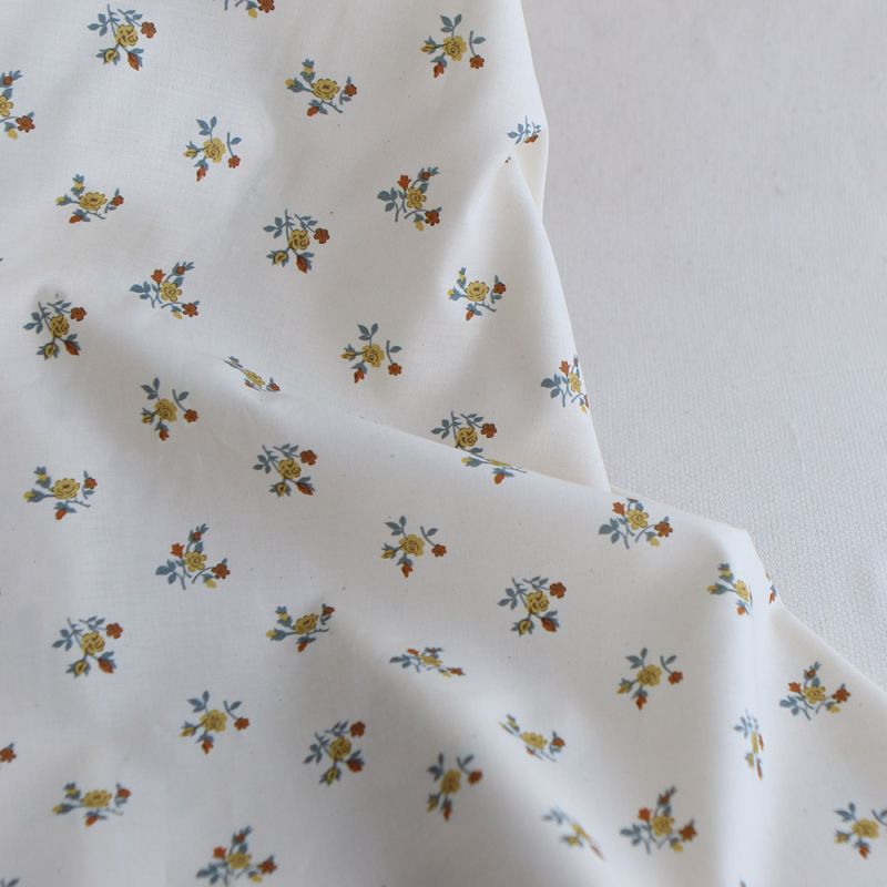 Celine - Popeline douce coton organique fond ivoire fleuri ocre / moutarde