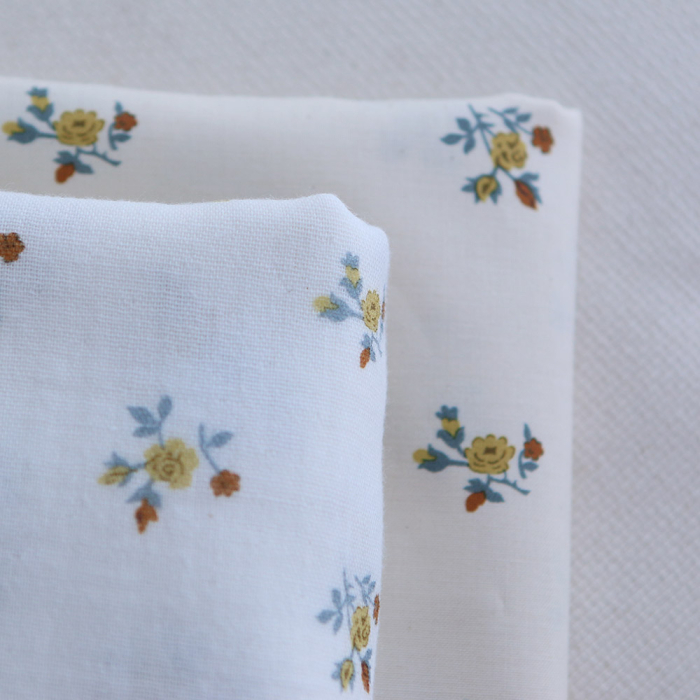 Celine - Popeline douce coton organique fond ivoire fleuri ocre / moutarde