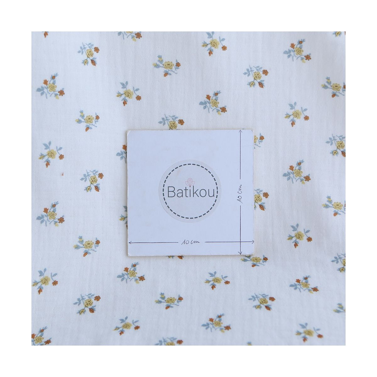 Celine - Double gaze de coton BIO blanc motif fleuri coloris ocre / moutarde