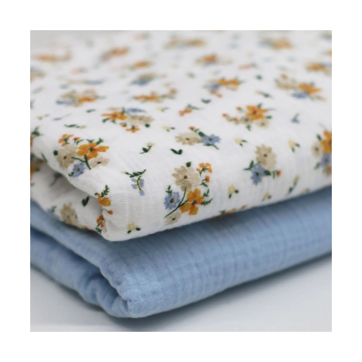 Double gaze de coton imprimés fleuri bleu et orange Double gaze de coton imprimés fleuri bleu et orange