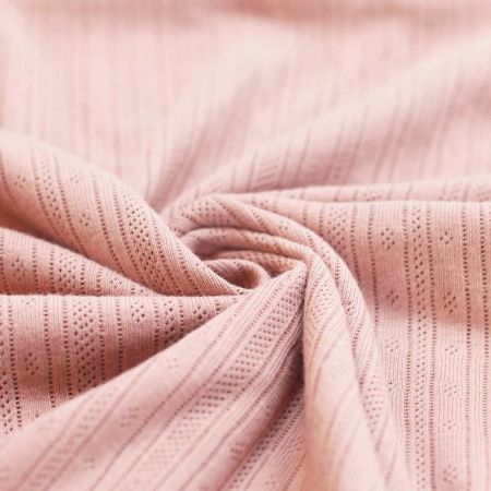 Jersey coton maille pointelle coloris rose nude