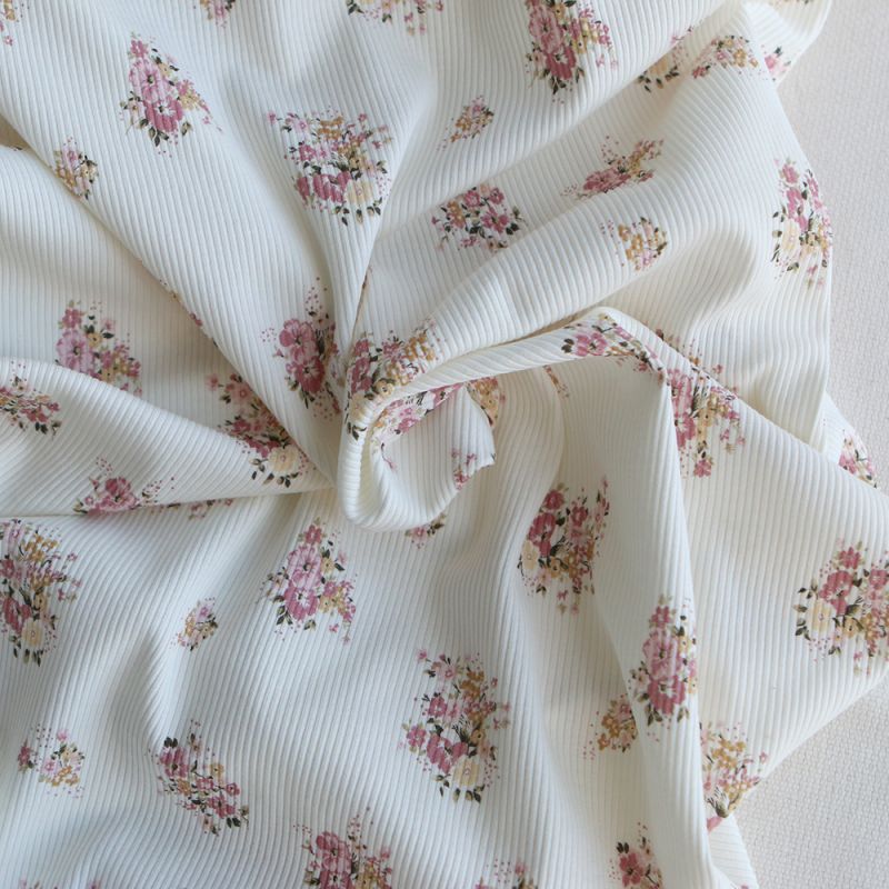 Jersey coton côtes fines à motif fleuri rose