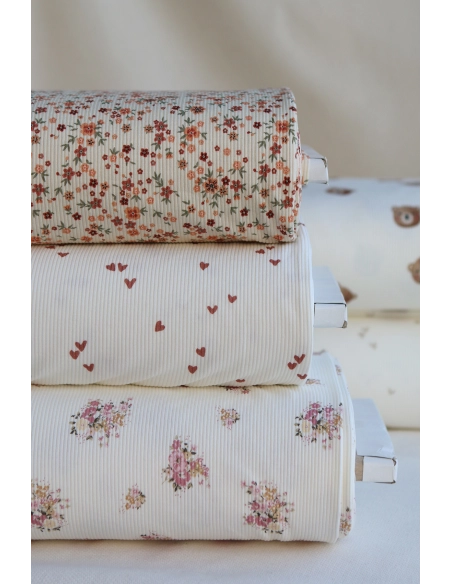 Jersey coton côtes fines à motif fleuri rose