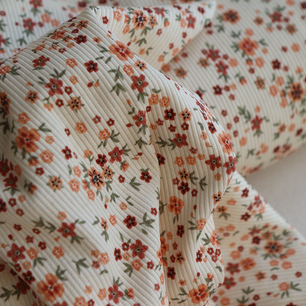 Jersey coton côtes fines à motif fleuri terracotta