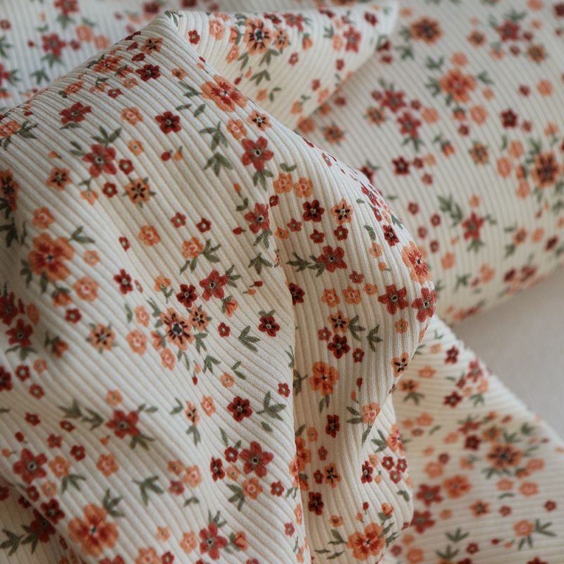 Jersey coton côtes fines à motif fleuri terracotta