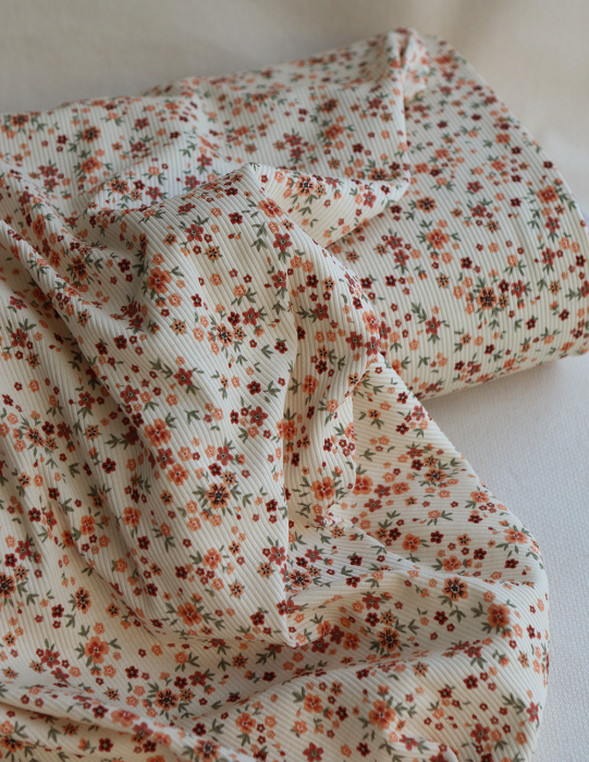 Jersey coton côtes fines à motif fleuri terracotta