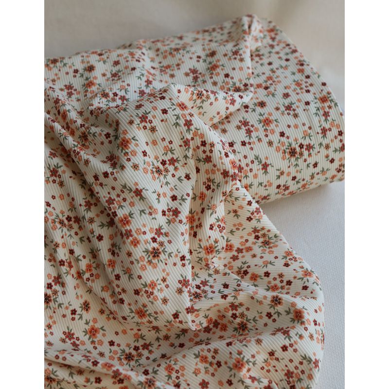 Jersey coton côtes fines à motif fleuri terracotta