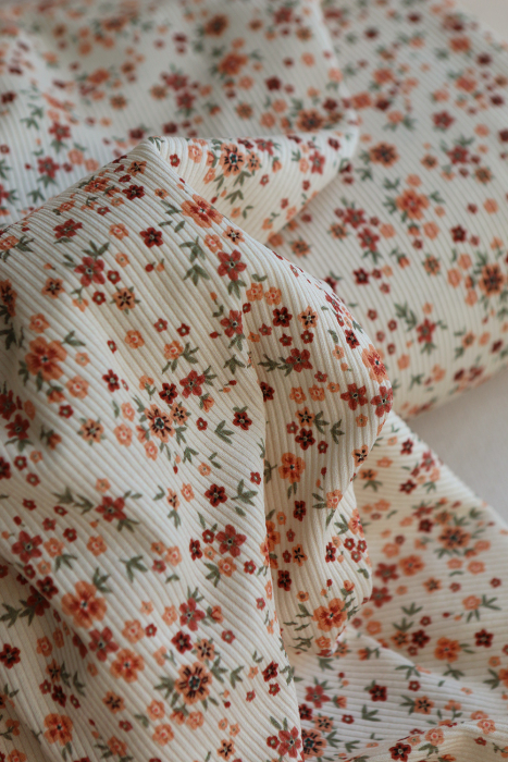 Jersey coton côtes fines à motif fleuri terracotta