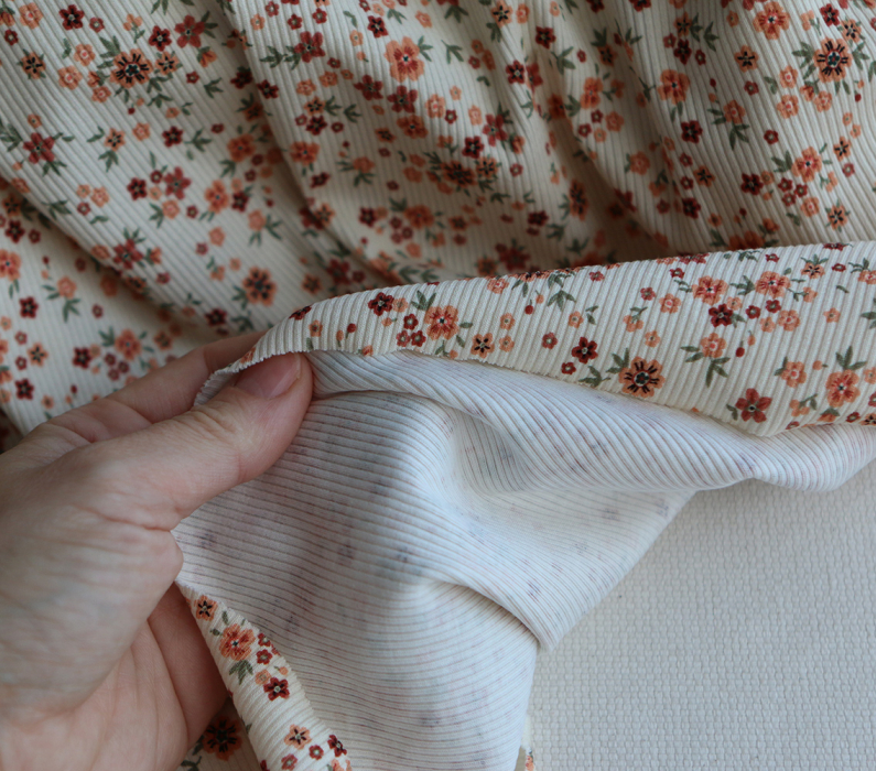 Jersey coton côtes fines à motif fleuri terracotta