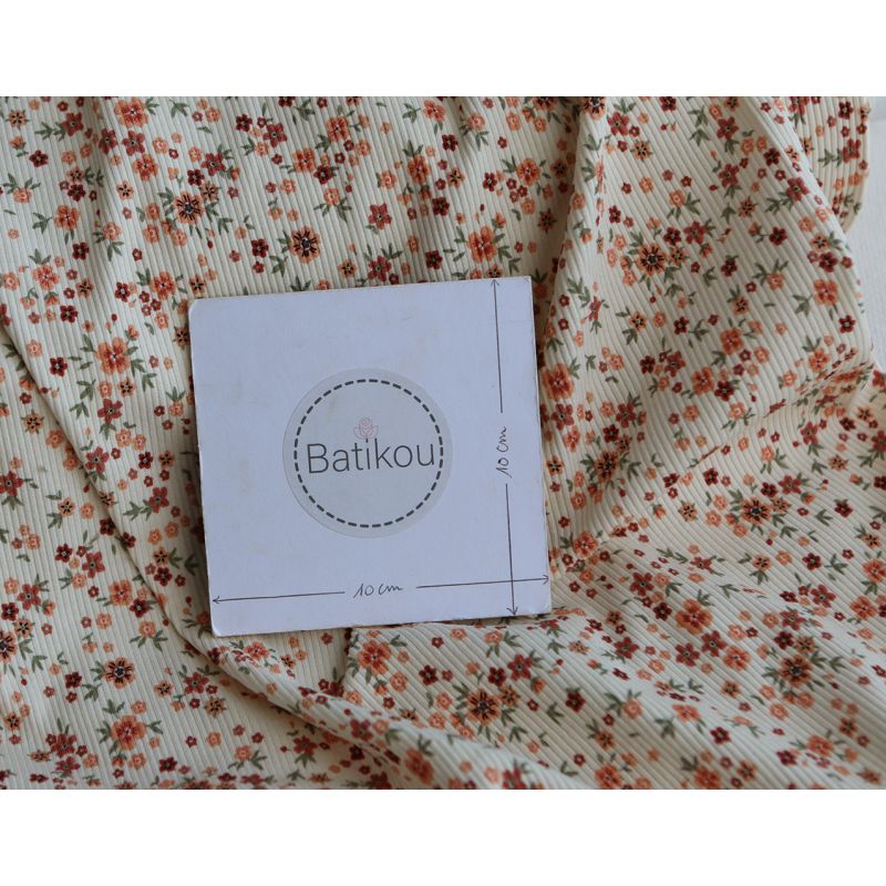 Jersey coton côtes fines à motif fleuri terracotta