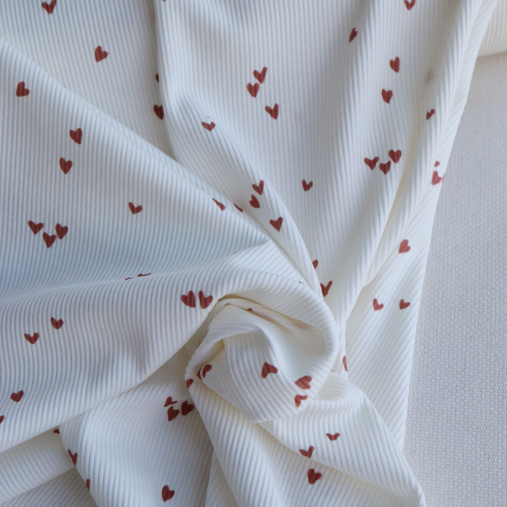 Jersey coton côtes fines à motifs mini coeurs lie de vin