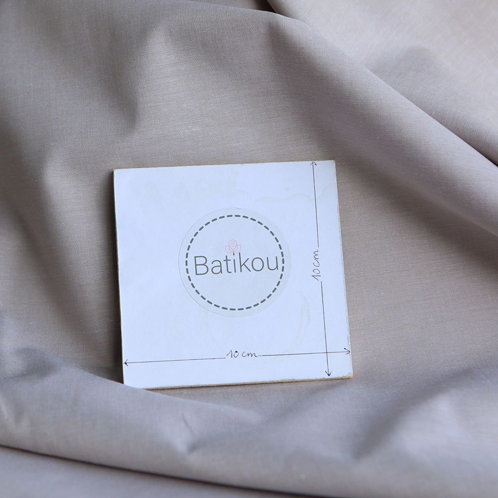 Popeline coton uni chiné effet chambray beige sable