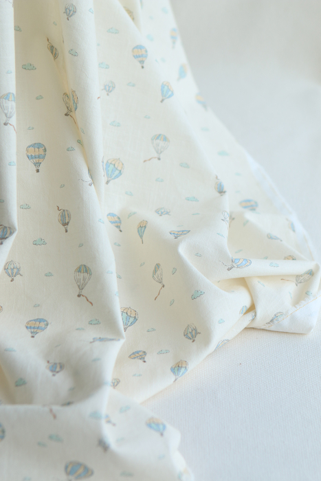 Fergusson - Coton lavé bio coloris vanille motif montgolfière