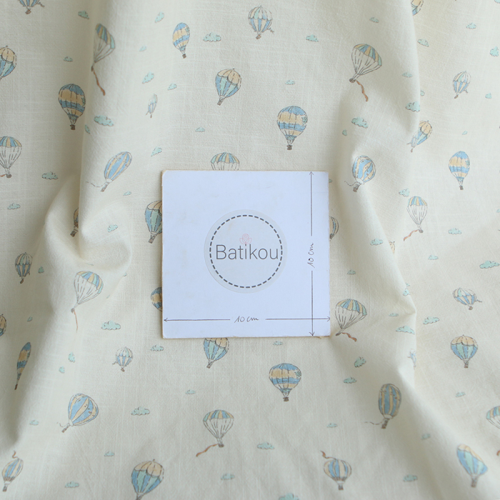 Fergusson - Coton lavé bio coloris vanille motif montgolfière