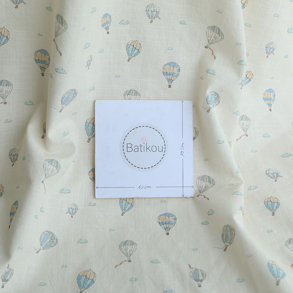 Fergusson - Coton lavé bio coloris vanille motif montgolfière