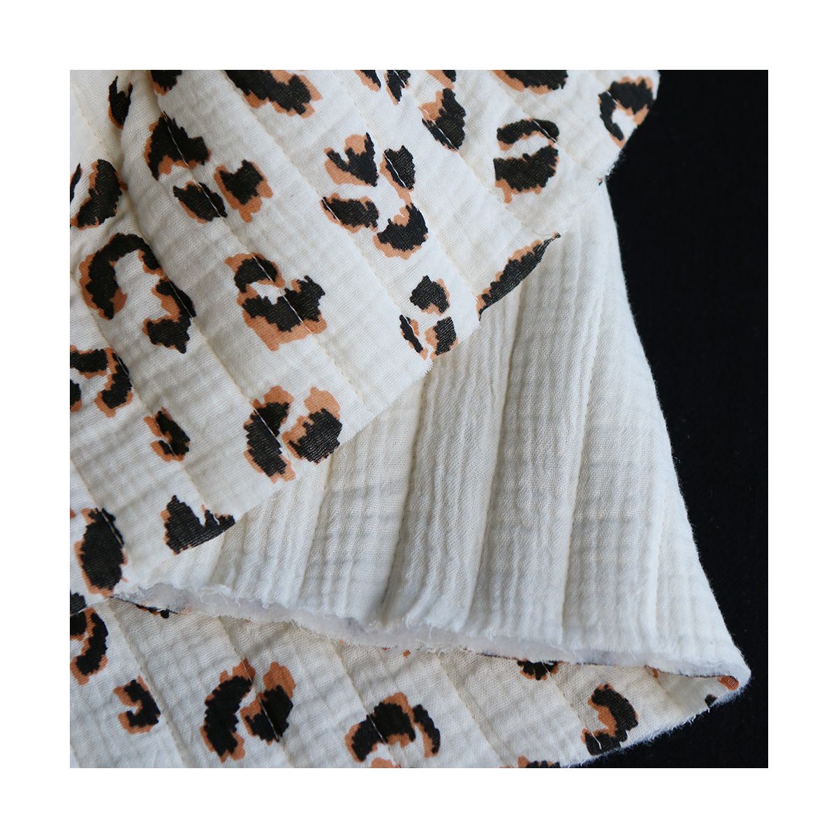 Fauve - Matelassé double gaze de coton motif Graou écru Fauve - Matelassé double gaze de coton motif Graou écru