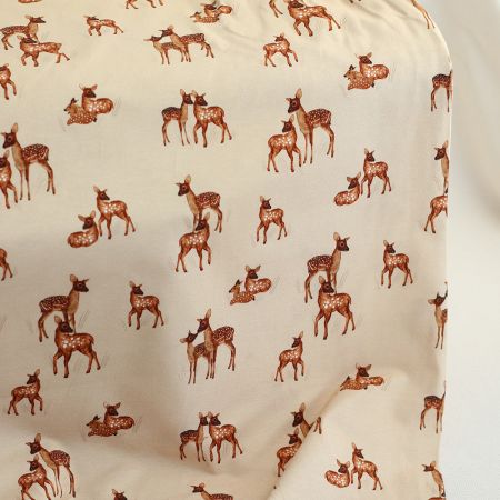 Bichette - Jersey coton à motif biches sur fond beige
