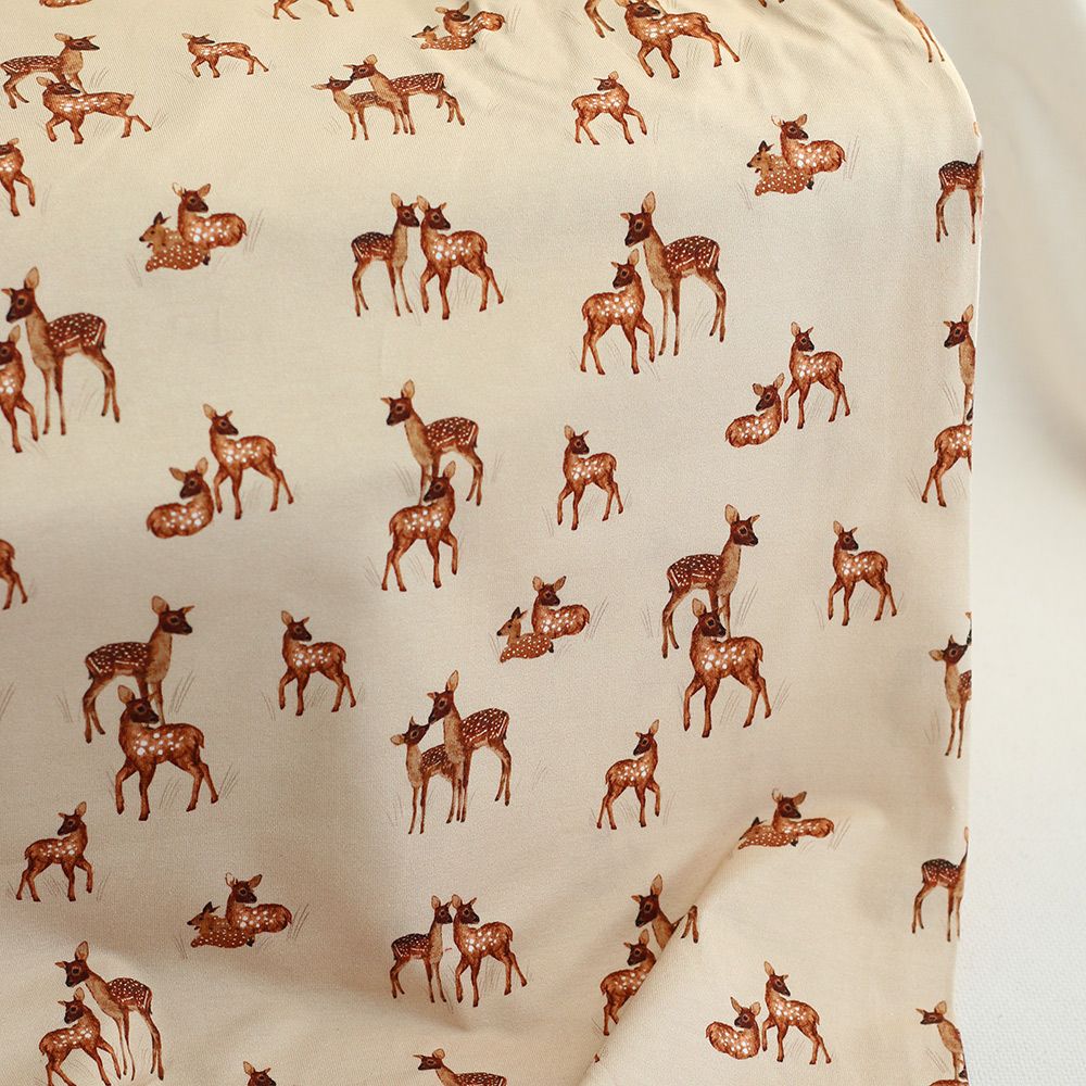 Bichette - Jersey coton à motif biches sur fond beige