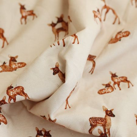 Bichette - Jersey coton à motif biches sur fond beige