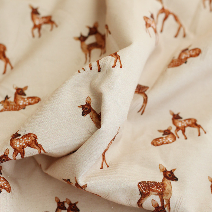 Bichette - Jersey coton à motif biches sur fond beige