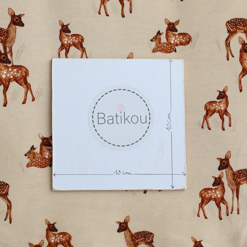 Bichette - Jersey coton à motif biches sur fond beige