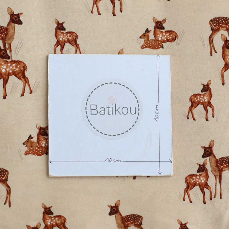 Bichette - Jersey coton à motif biches sur fond beige