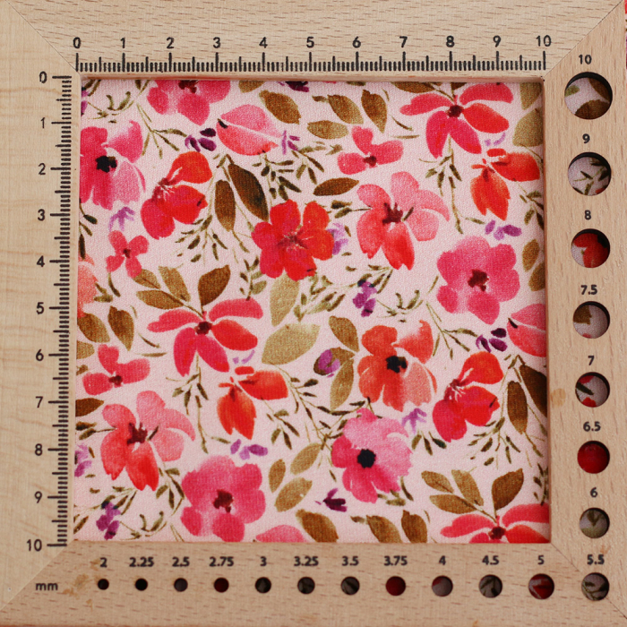 Jersey coton à motif fleuri rose