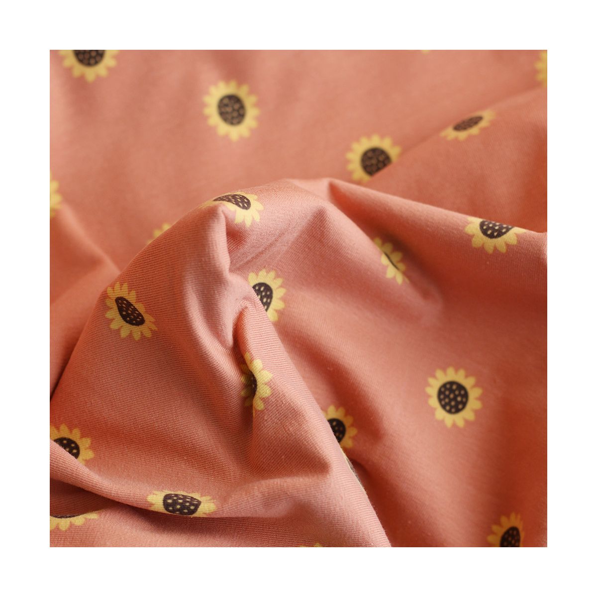 Jersey coton à motif fleurs de tournesol fond tomette clair Jersey coton à motif fleurs de tournesol fond tomette clair